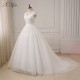 luxusní bílé tylové svatební šaty na ramínka Leroy S